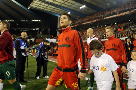 Belgique-Pays de Galles, dernier match de qualification pour le Mondial au Brésil de 2014, où la Belgique ira jusqu’en quart de finale. Sébastien Pocognoli : « Quand on gagne avec son club, on touche des dizaines de milliers de personnes. Quand on joue pour son pays, c’est 11 millions de personnes... Ces moments rassembleurs, de partage à une si grande échelle, sont rares à notre époque. C’est beau... » (Photo Belga)